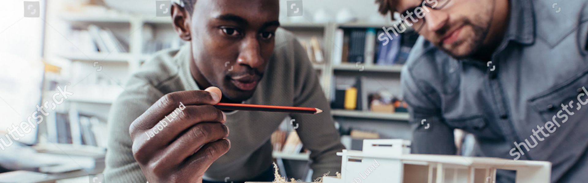 stock photo two male architects in office discussing construction project young men working together on new 715242859